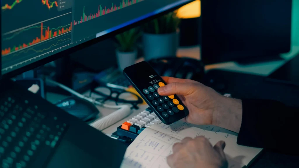 Crypto trading fee calculation and market analysis on a dashboard showing cost evaluation for cryptocurrency trading platforms in 2026